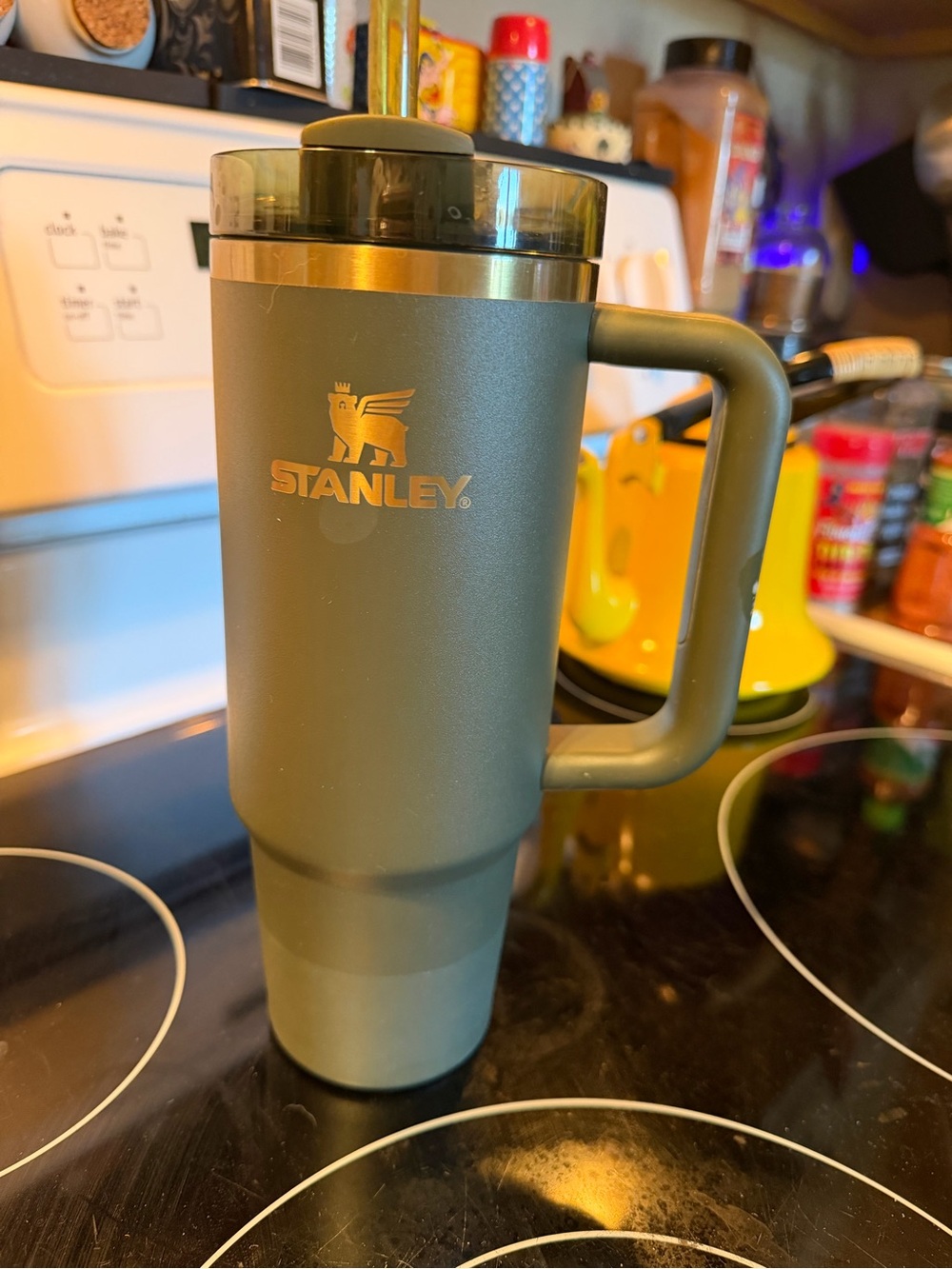 Stanley Olive Green Travel Tumbler with Handle and Gold Logo